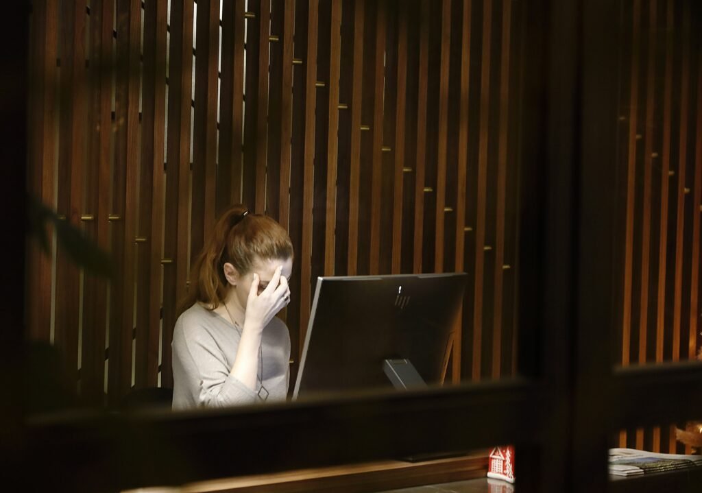 Google and Microsoft password warning alert showing account security risk.