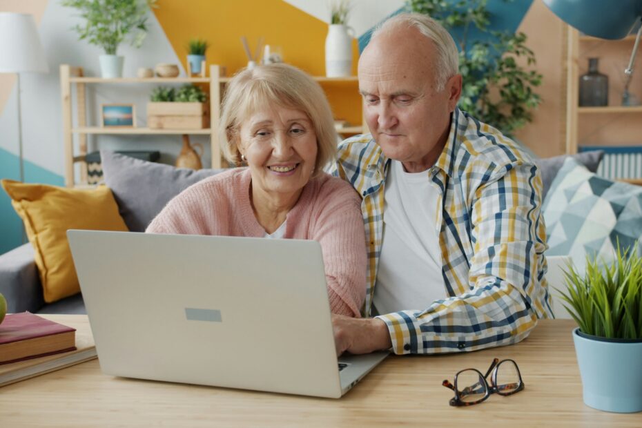 Happy couple using one of the Best Debt Relief Companies 2025 to settle credit card debt.