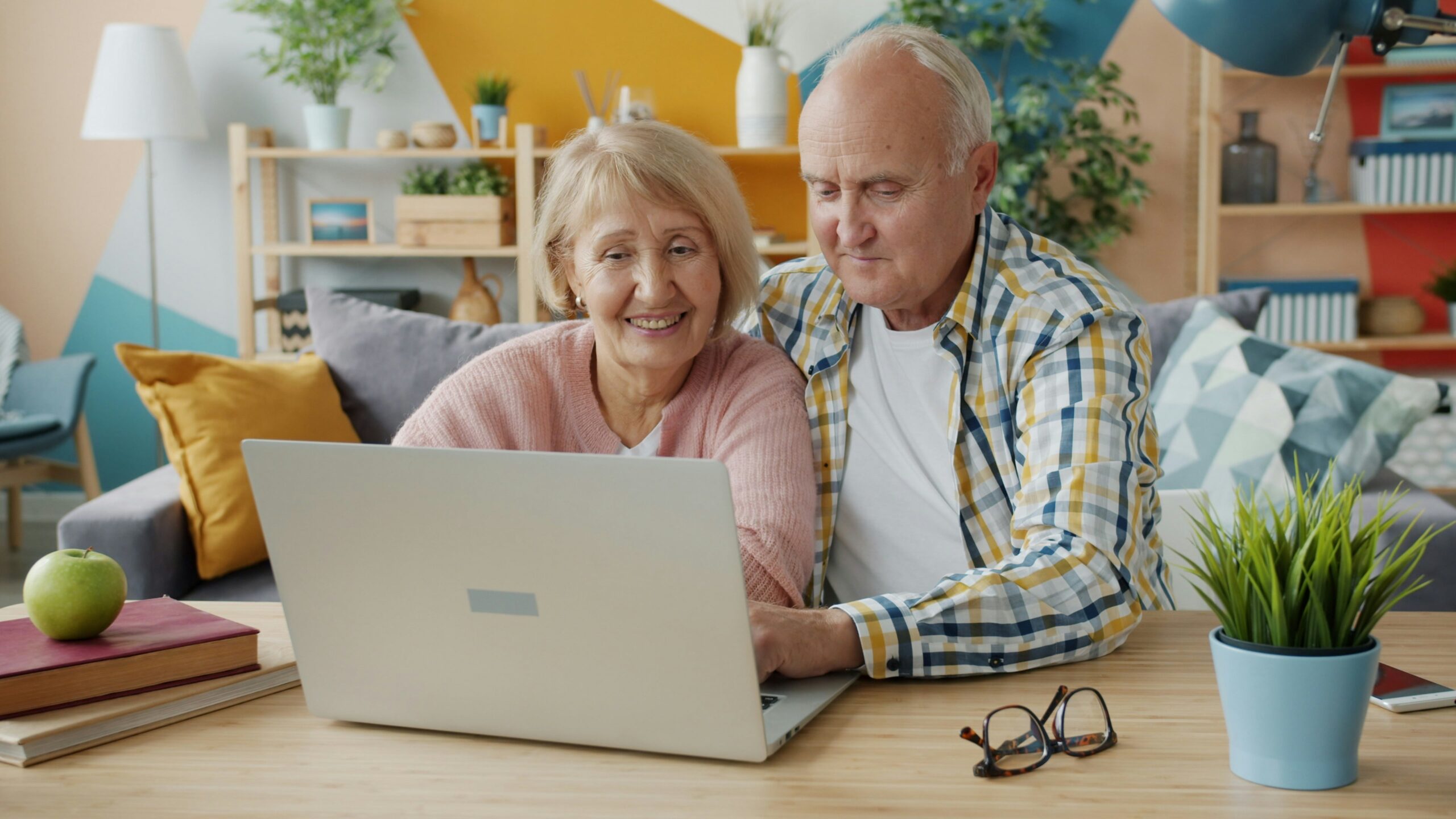 Happy couple using one of the Best Debt Relief Companies 2025 to settle credit card debt.
