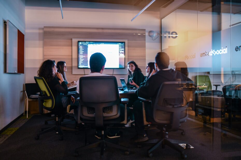 Corporate team learning AI skills in a modern training session
